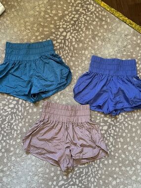 Three pair FP Movement high waisted lined shorts. Medium.